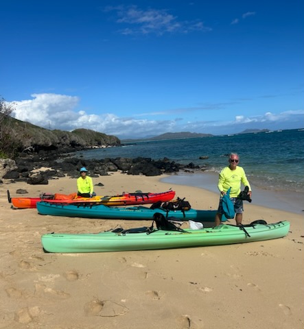 Three kayaks on the beach